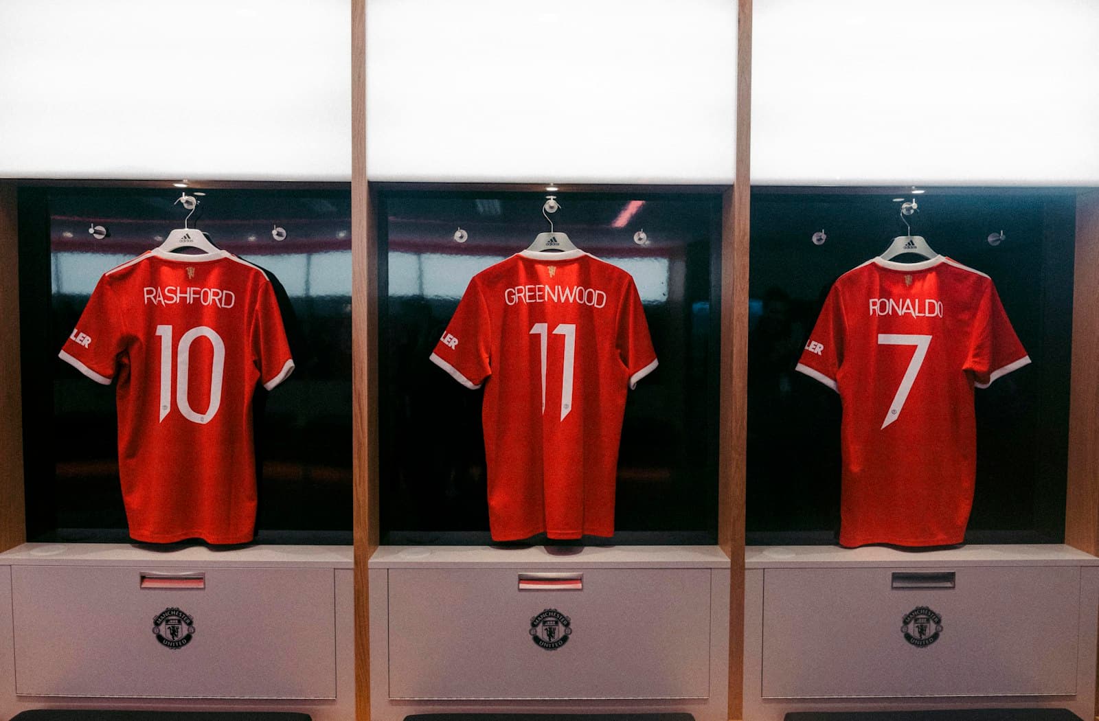 Red soccer jerseys on display