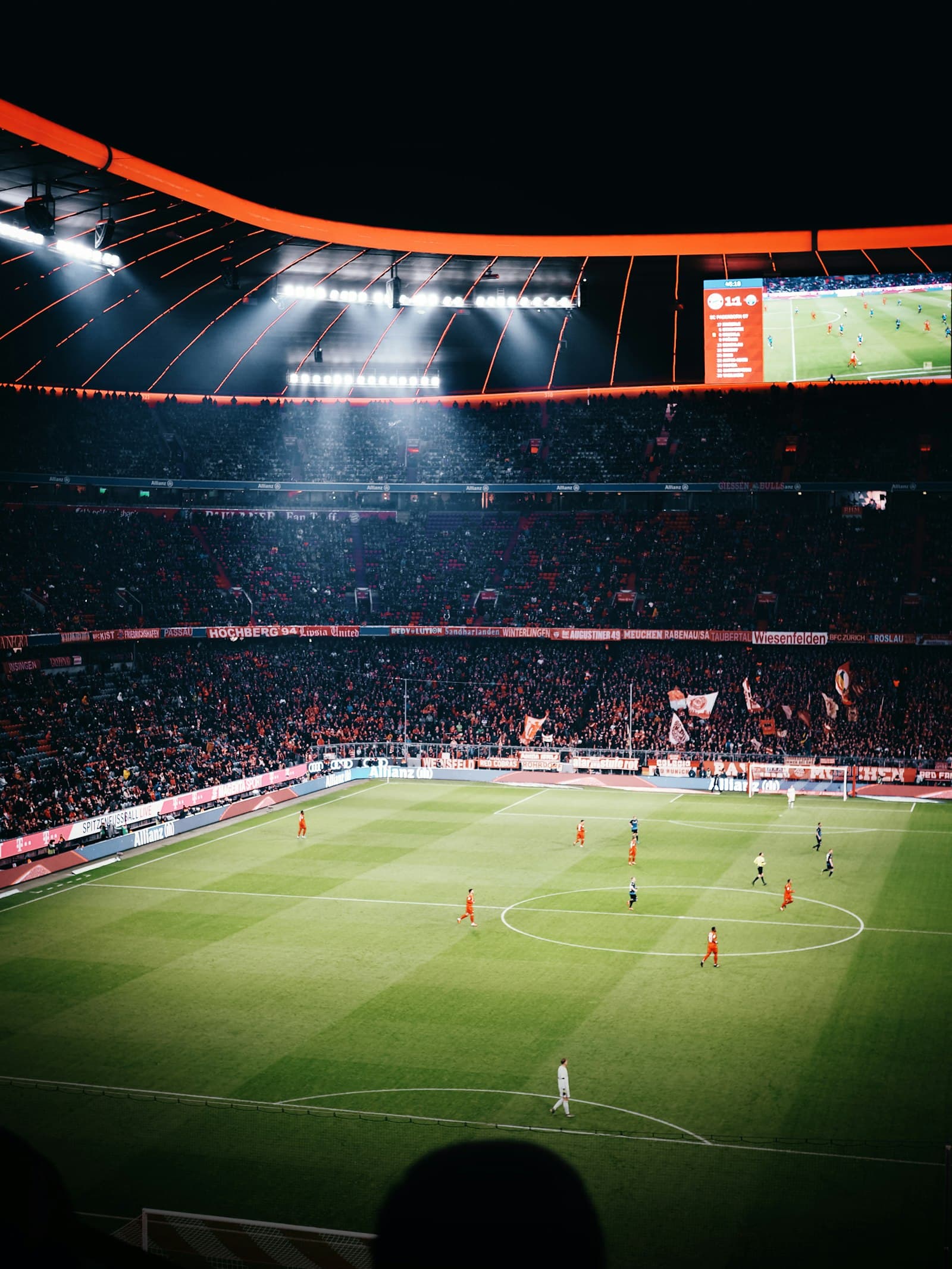 Crowd watching a match at a packed arena